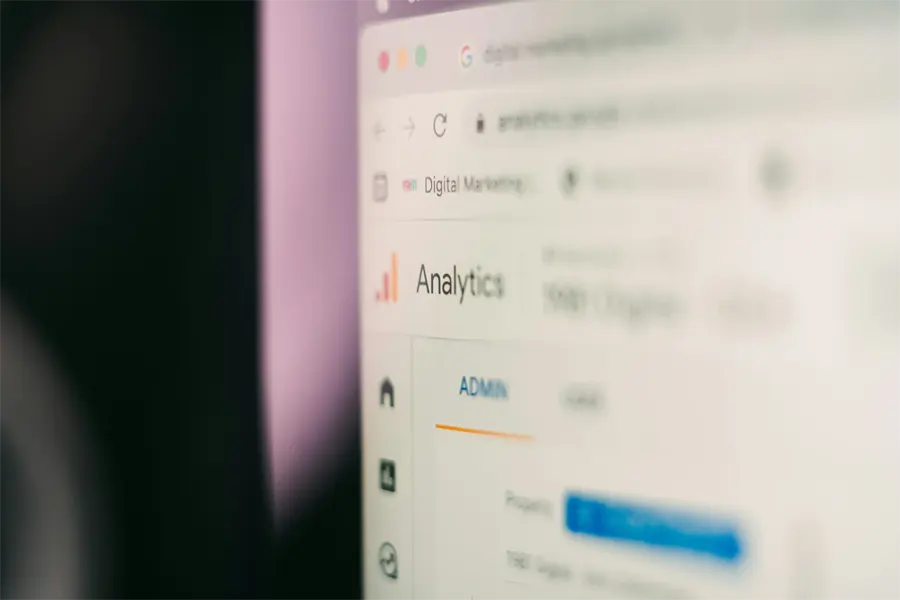 Blurred close-up of a browser showing a Google Analytics menu