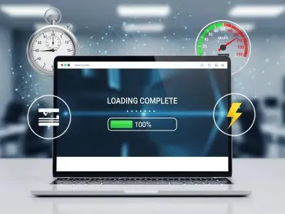 Laptop displaying a "Loading Complete" message with a progress bar at 100%, surrounded by icons representing speed optimisation, including a stopwatch and a speedometer, symbolising advanced page speed techniques for improved website performance.