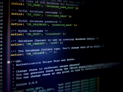 Code snippet displaying PHP MySQL database configuration settings, illustrating programming concepts relevant to WordPress development and web design.