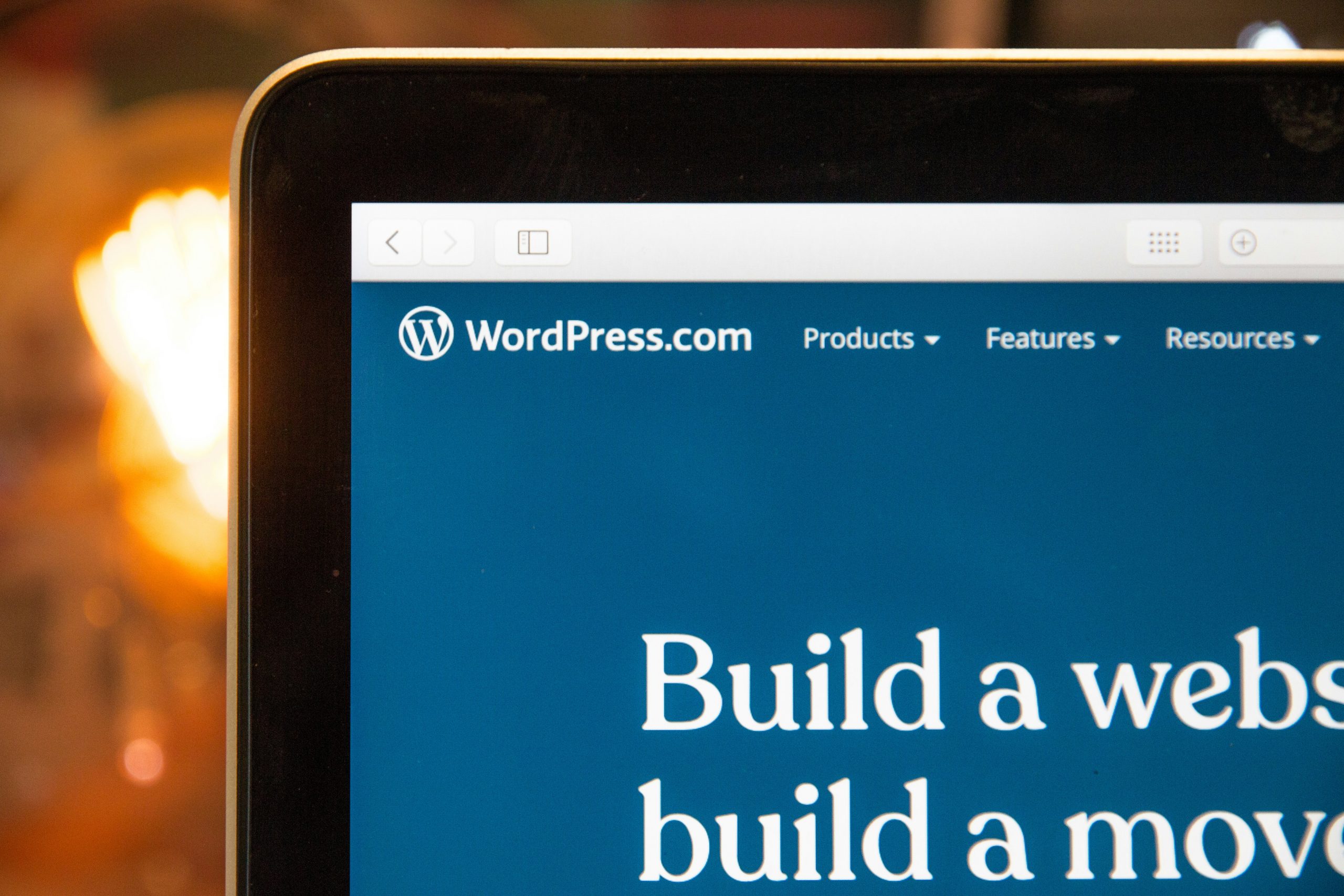 WordPress.com interface displaying "Build a website" text, relevant for WordPress design guidance and web development insights.