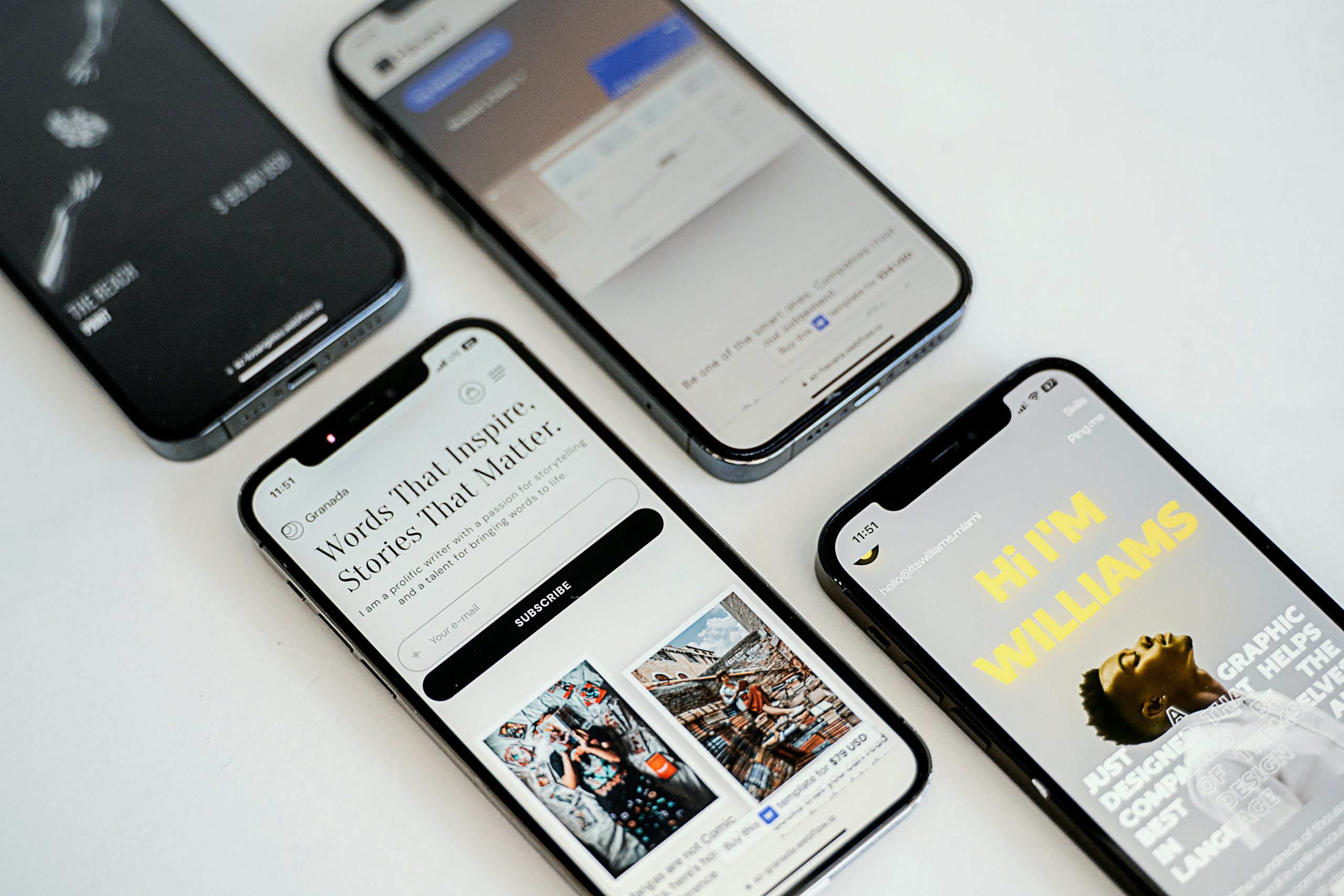 Multiple smartphones displaying various mobile-friendly website designs, showcasing responsive layouts and user interfaces relevant to enhancing user experience and engagement.